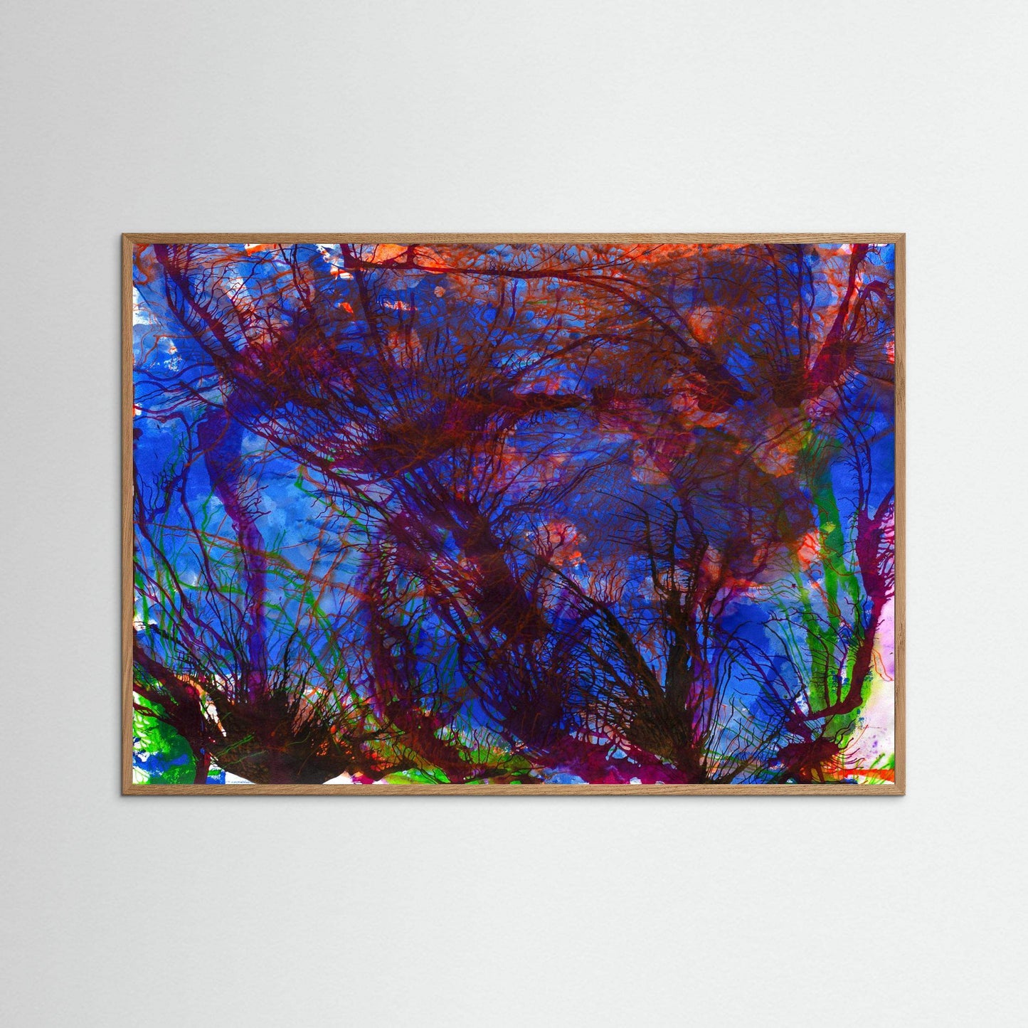 Wild Irish Ocean wall art with vibrant blue and red abstract sea-inspired design in wooden frame